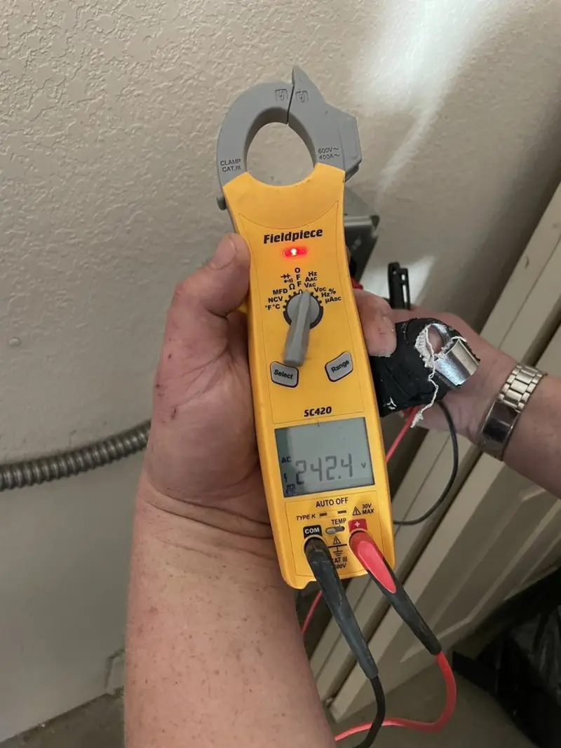 Voltage testing with clamp meter during Hot Tub / Pool Electrical Wiring in Freehold